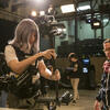 Student operating a Steadicam in a media arts class. 